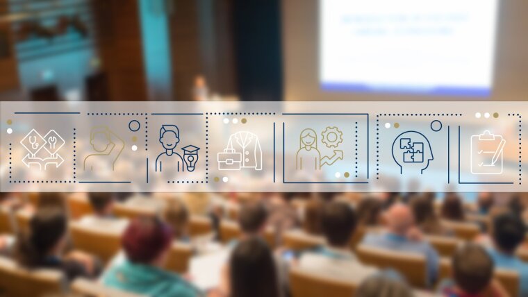 Students in the lecture hall, in the middle a banderole with icons representing practical skills